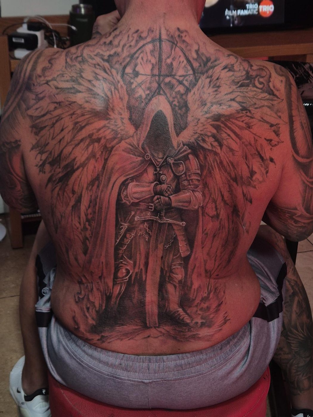 Hooded angel back piece